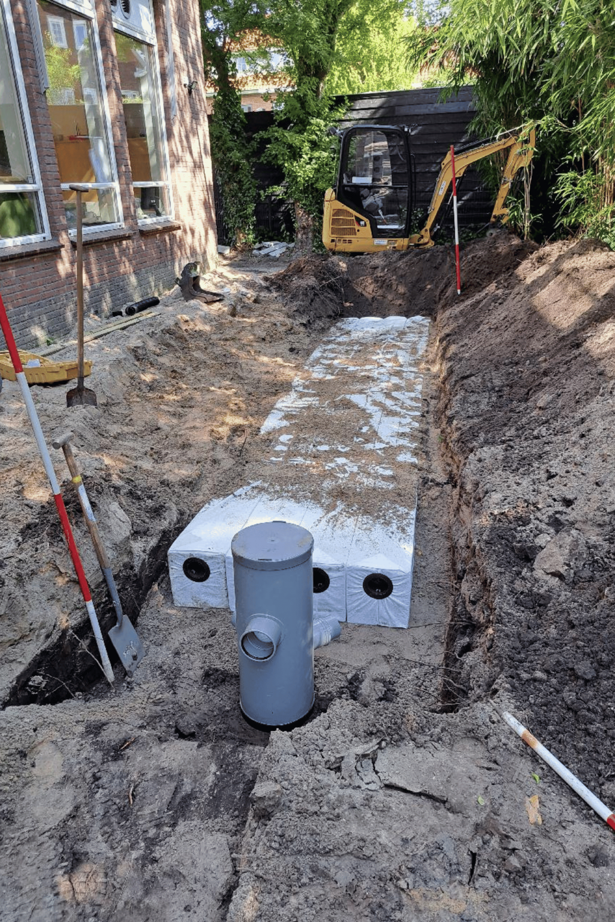 Aanleg hydrorocks op speelplein